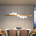 Lampadario moderno 7 luci G9 design lineare oro