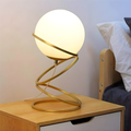 Lampada da tavolo moderna G9 oro con spirale e sfera vetro